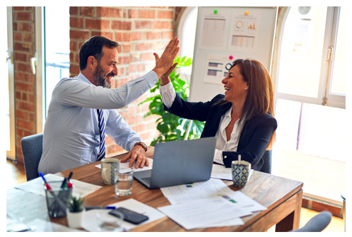 man and woman clapping hands together